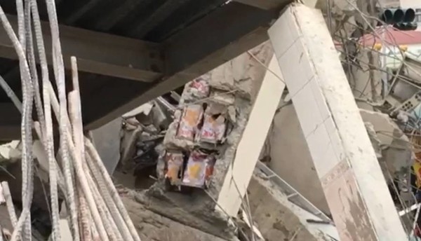 Đài Loan: Phát hiện can dầu ăn trong cột nhà của tòa chung cư bị sập - Ảnh 1.