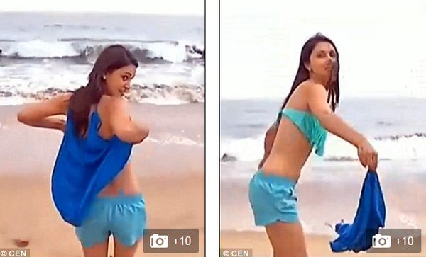 Nữ phóng viên xinh đẹp bị sóng đánh tụt bikini trên sóng truyền hình trực tiếp - Ảnh 2.