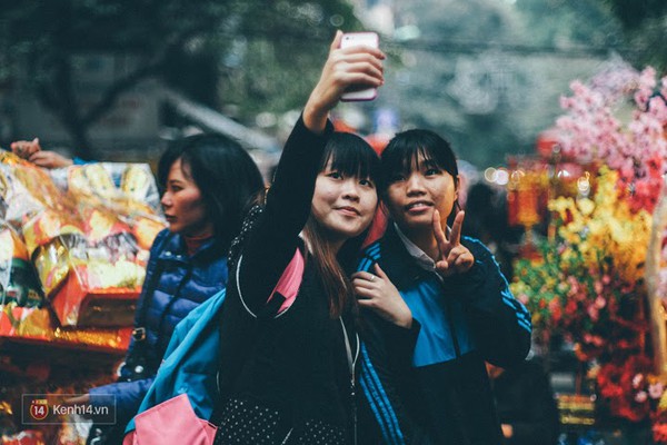 Những h&igrave;nh ảnh nhắc rằng Tết đ&atilde; cận kề tr&ecirc;n từng g&oacute;c phố H&agrave; Nội - Ảnh 9.