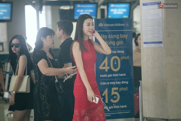 Hoa hậu Đỗ Mỹ Linh xinh đẹp rạng ngời tại sân bay về Hà Nội sáng nay! - Ảnh 10.