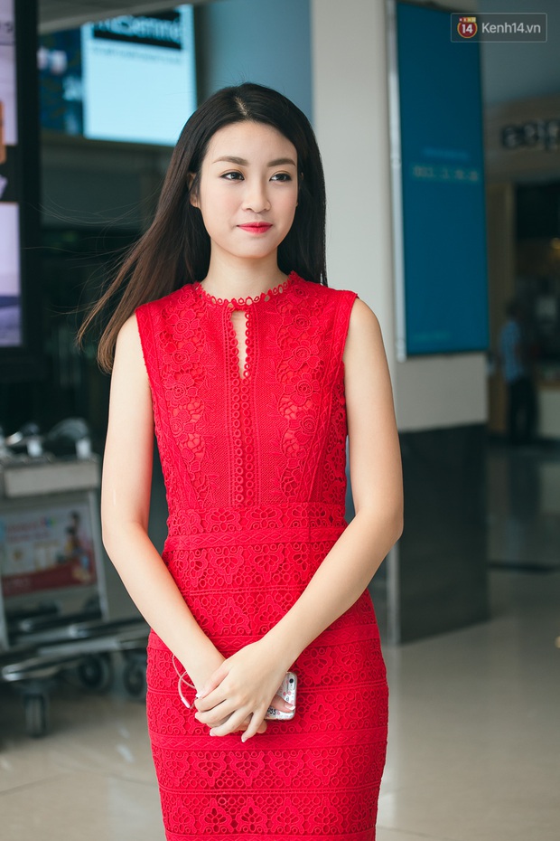 Hoa hậu Đỗ Mỹ Linh xinh đẹp rạng ngời tại sân bay về Hà Nội sáng nay! - Ảnh 13.