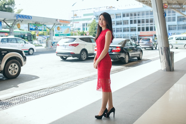 Hoa hậu Đỗ Mỹ Linh xinh đẹp rạng ngời tại sân bay về Hà Nội sáng nay! - Ảnh 19.