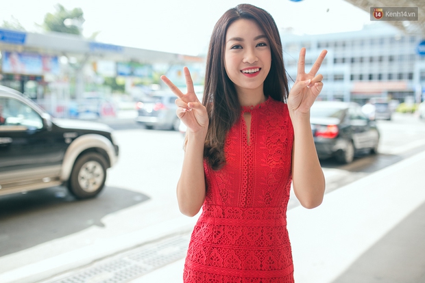 Hoa hậu Đỗ Mỹ Linh xinh đẹp rạng ngời tại sân bay về Hà Nội sáng nay! - Ảnh 20.