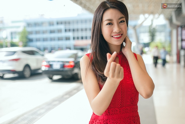 Hoa hậu Đỗ Mỹ Linh xinh đẹp rạng ngời tại sân bay về Hà Nội sáng nay! - Ảnh 23.