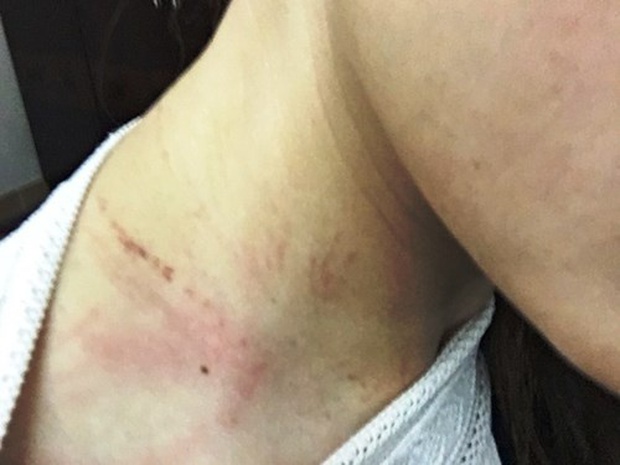 Nữ nhân viên bị đánh tại sân bay: Tôi không hề to tiếng với khách, chỉ quay lại hành vi hung hăng của họ - Ảnh 2.