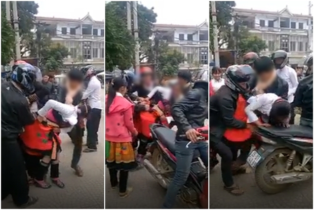 Cô gái bị kéo tuột váy vì nhóm thanh niên đi bắt vợ tại trung tâm chợ thị trấn Phù Yên - Ảnh 1.