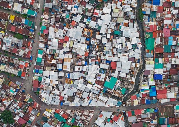 Những hình ảnh “nghẹt thở” về cuộc sống ở Manila - thành phố đông dân cư bậc nhất thế giới - Ảnh 1.