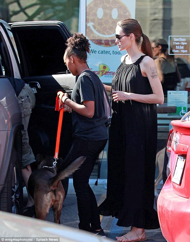 Angelina Jolie's daughter Shiloh is getting taller and more handsome - Photo 6.