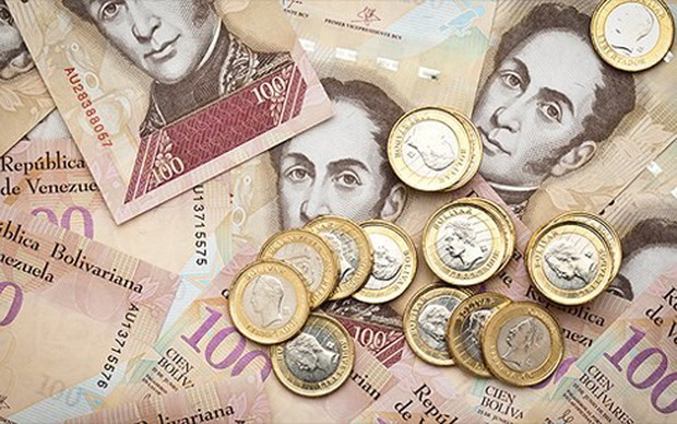Lạm phát tại Venezuela: Những chồng tiền khổng lồ mà người dân phải chi trả cho nhu yếu phẩm hàng ngày sẽ khiến bạn thấy sốc! - Ảnh 1.