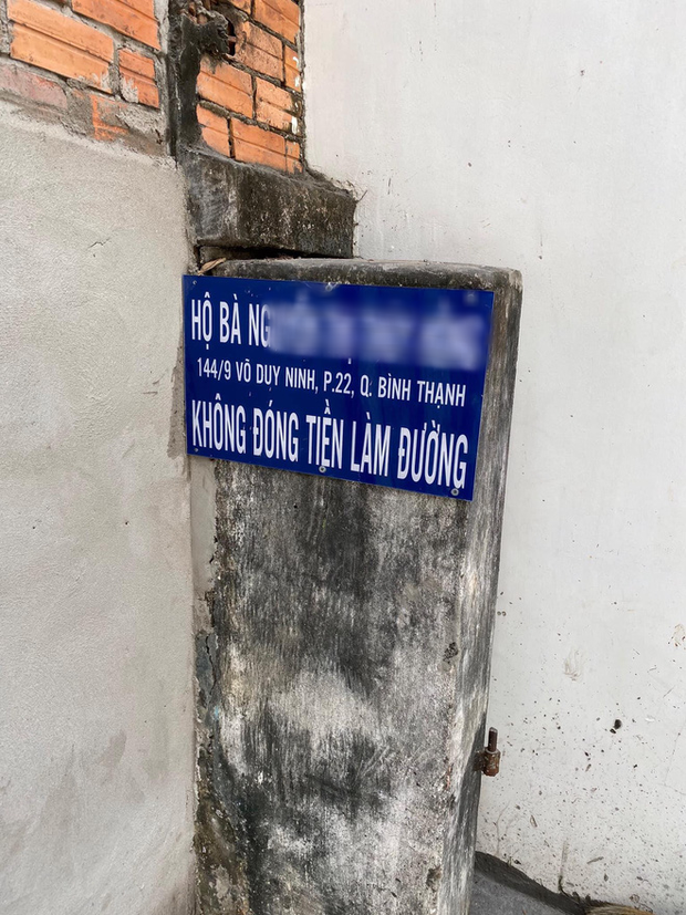 TP.HCM: Một hộ dân bức xúc khi bị bêu rếu tên do không đóng tiền làm đường - Ảnh 1.