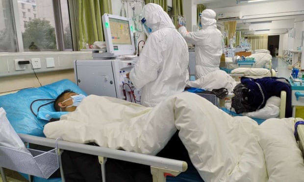 Những người tiến vào tâm dịch Vũ Hán: Anh hùng chống SARS 84 tuổi trở lại cuộc chiến với virus, nhà báo vượt qua nỗi sợ để đưa tin - Ảnh 5. Những người tiến vào tâm dịch Vũ Hán: Anh hùng chống SARS 84 tuổi trở lại cuộc chiến với virus, nhà báo vượt qua nỗi sợ để đưa tin - Ảnh 5.