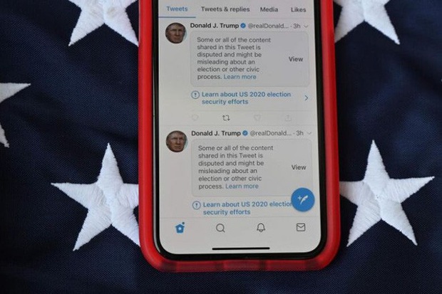 Tài khoản Twitter của ông Donald Trump bị tước bỏ mọi đặc quyền - Ảnh 1.