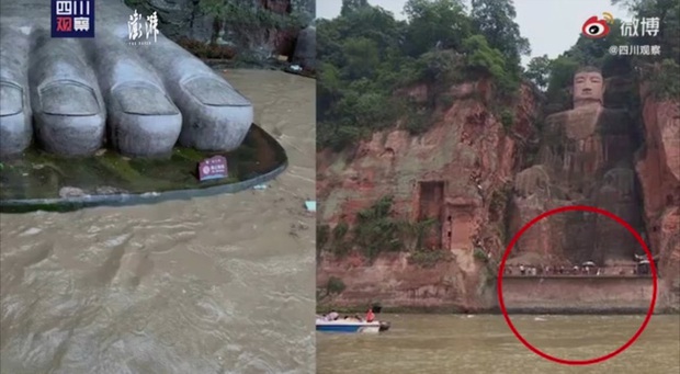 Mưa lớn kéo dài ở Tứ Xuyên tạo nên trận lũ lớn nhất sau 65 năm, khiến nước dâng cao đến bệ chân tượng Phật khổng lồ - Ảnh 1.