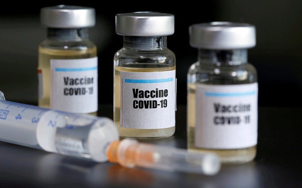 Hé lộ những phản ứng phụ của vaccine COVID-19 - Ảnh 1.