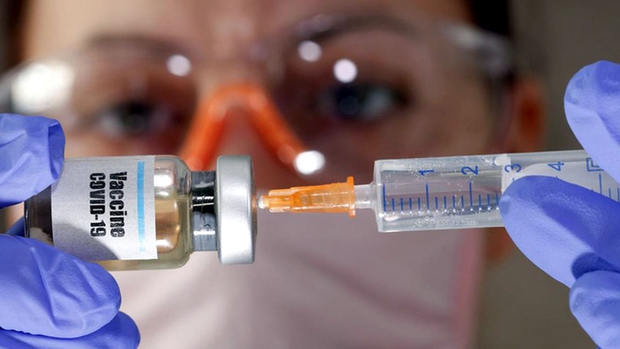 Nhiều quốc gia khởi động chương trình tiêm chủng vaccine Covid-19 - Ảnh 1. Nhiều quốc gia khởi động chương trình tiêm chủng vaccine Covid-19 - Ảnh 1.