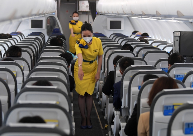 Giải mã ý nghĩa tư thế chào và trang phục của đoàn tiếp viên Vietravel Airlines trong buổi lễ ra mắt - Ảnh 7.