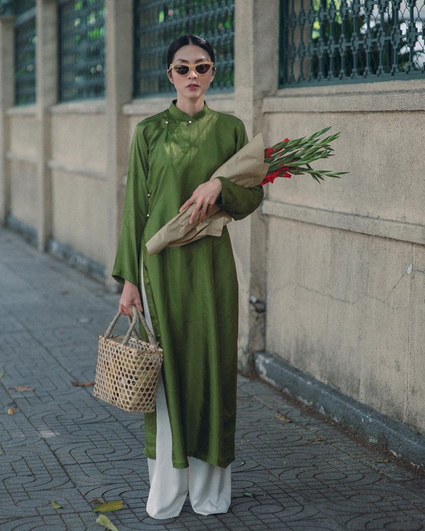 2 tuần nữa mới Tết nhưng mỹ nhân Việt đã thi nhau thả dáng với áo dài: Người đơn giản chất chơi, người lồng lộn hết sức - Ảnh 1.