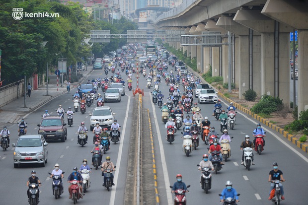 Hà Nội khuyến khích người dân hạn chế tới các địa phương khác sau khi nâng cấp độ phòng dịch từ xanh lên vàng - Ảnh 2.