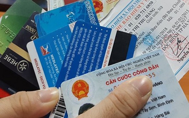 Ngoài thẻ từ ATM, 2 loại giấy tờ quan trọng khác người dân cần làm ngay trước 31/12/2021 - Ảnh 1.