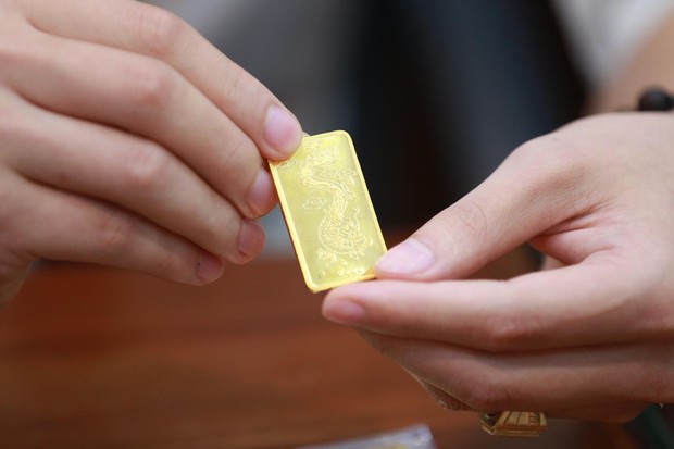Hơn 1 tuần, vàng SJC tăng 800.000 đồng/lượng, vượt mốc 59 triệu đồng - Ảnh 1.