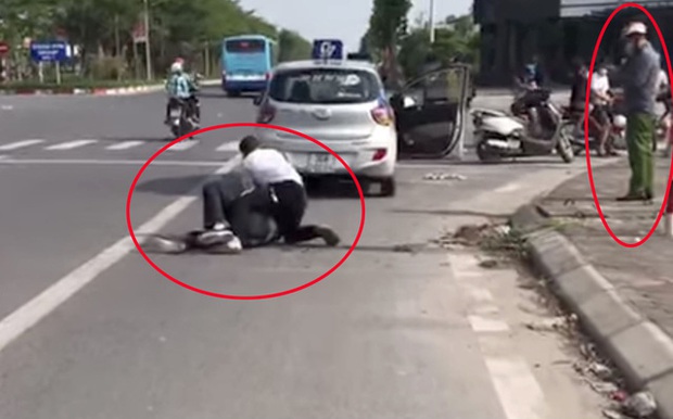 Đại uý công an đứng gọi điện thoại trong khi tài xế taxi vật lộn với tên cướp giải trình gì? - Ảnh 1. Đại uý công an đứng gọi điện thoại trong khi tài xế taxi vật lộn với tên cướp giải trình gì? - Ảnh 1.