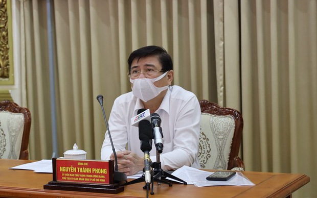 Chủ tịch UBND TP Nguyễn Thành Phong lấy ý kiến quận Gò Vấp, quận 12: Có tiếp tục giãn cách nữa hay không - Ảnh 1. Chủ tịch UBND TP Nguyễn Thành Phong lấy ý kiến quận Gò Vấp, quận 12: Có tiếp tục giãn cách nữa hay không - Ảnh 1.