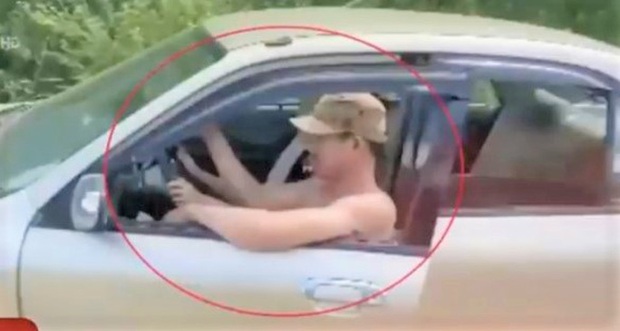 Xử phạt đôi nam nữ trong clip ngồi chung ghế lái ô tô lao vun vút trên đường - Ảnh 1. Xử phạt đôi nam nữ trong clip ngồi chung ghế lái ô tô lao vun vút trên đường - Ảnh 1.