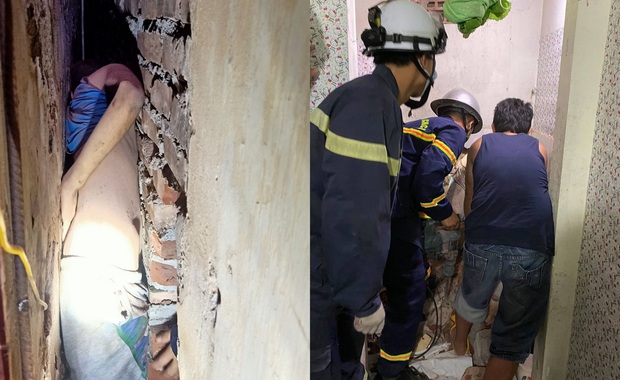 Hà Nội: Giải cứu thiếu niên tự kỷ bị kẹt giữa khe tường 2 nhà dân - Ảnh 1.