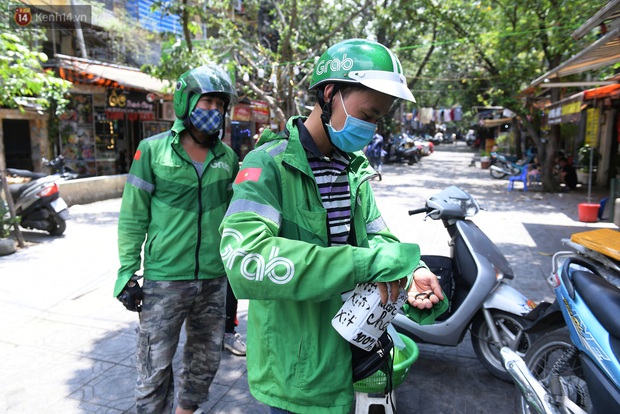 Hà Nội dừng hoạt động shipper công nghệ, nhân viên giao hàng siêu thị và bưu tá được hoạt động - Ảnh 1.