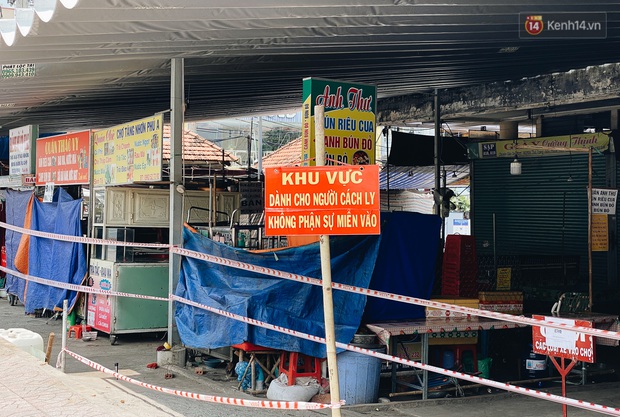 Cận cảnh phong tỏa toàn chợ Tăng Nhơn Phú ở TP. Thủ Đức do có ca F0 từng đến - Ảnh 7.