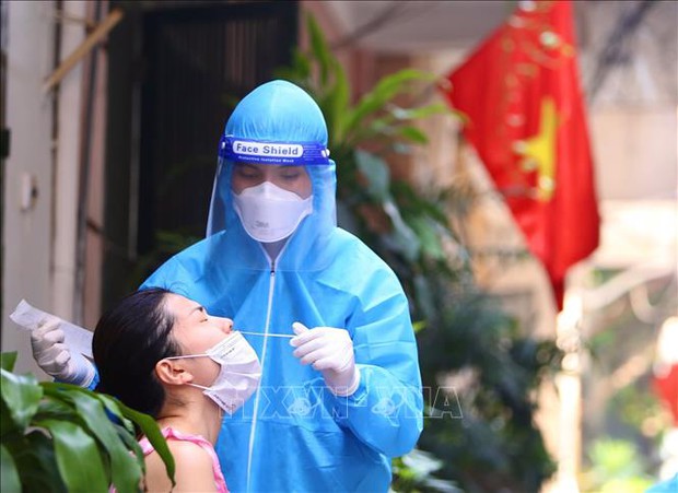 Hà Nội: Không bắt buộc xét nghiệm COVID-19 đối với trẻ em dưới 12 tuổi - Ảnh 1. Hà Nội: Không bắt buộc xét nghiệm COVID-19 đối với trẻ em dưới 12 tuổi - Ảnh 1.