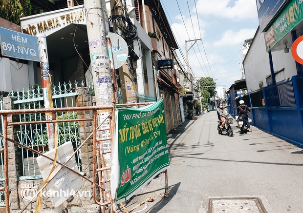 Ảnh: Nhiều rào chắn bít bùng ở TP.HCM dần được dỡ bỏ, người dân di chuyển bình thường - Ảnh 12.