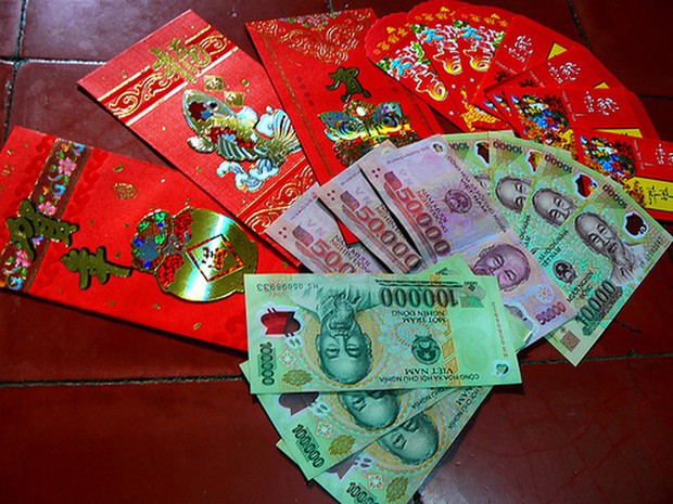Bố mẹ thu tiền lì xì của con có thể bị phạt đến 30 triệu đồng - Ảnh 1.