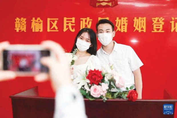Vì sao giới trẻ Trung Quốc ngại kết hôn? - Ảnh 1.