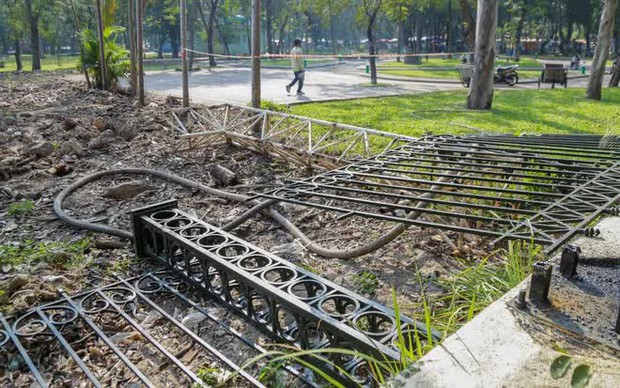 Cận cảnh dỡ bỏ hàng rào công viên Thống Nhất để kết nối với phố đi bộ ở Hà Nội - Ảnh 9.