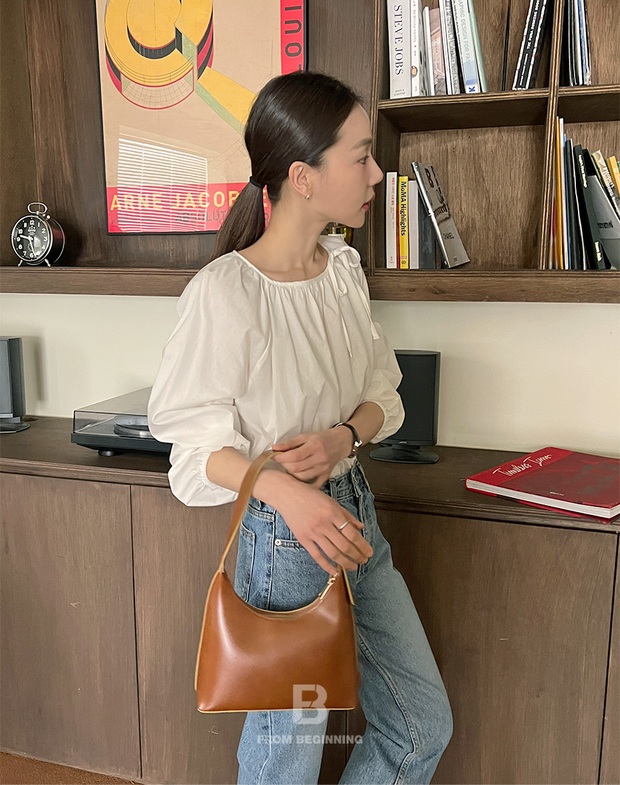 Mùa hè nhất định phải sắm 4 kiểu áo trắng này để mặc thế nào cũng trẻ trung, tinh tế - Ảnh 9. Mùa hè nhất định phải sắm 4 kiểu áo trắng này để mặc thế nào cũng trẻ trung, tinh tế - Ảnh 9.
