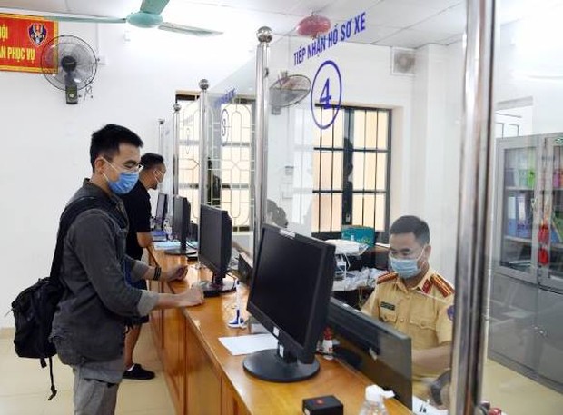 More than 3,400 commune police are ready to register motorbikes for people - Photo 2.