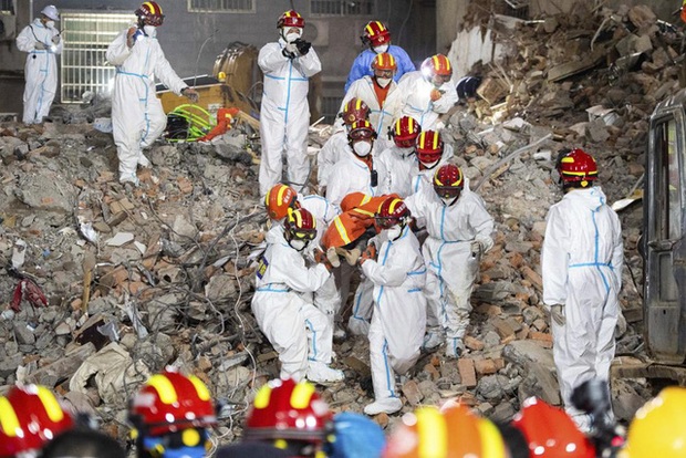 Vụ sập nhà ở Trung Quốc: Số người thiệt mạng tăng lên 53, kết thúc chiến dịch tìm kiếm cứu hộ - Ảnh 2.