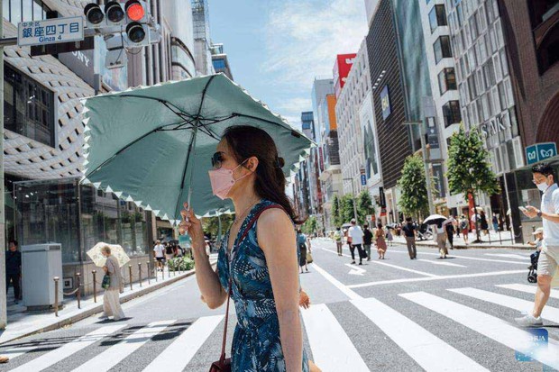 Hàng trăm người nhập viện do nắng nóng kỷ lục tại Nhật Bản - Ảnh 1.