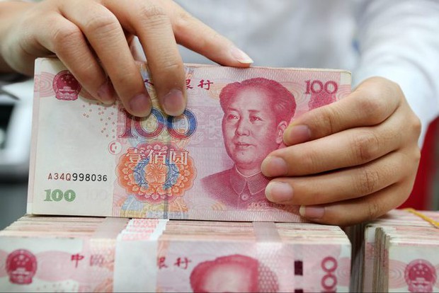 Người dân Trung Quốc tiếp tục đổ tiền vào gửi tiết kiệm - Ảnh 1.