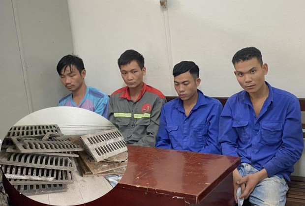 Một nhóm công nhân lát vỉa hè ở Hà Nội bị bắt - Ảnh 1.