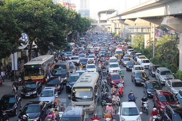 Phân làn tách dòng ô tô, xe máy trên đường Nguyễn Trãi từ 6/8 - Ảnh 1.