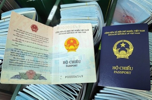Bộ Ngoại giao thông tin về tình hình cấp thị thực với hộ chiếu mẫu mới - Ảnh 1.