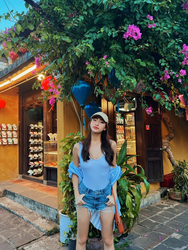 Hoa hậu Lương Thùy Linh khoe sắc vóc quyến rũ trên bãi biển - Ảnh 5.