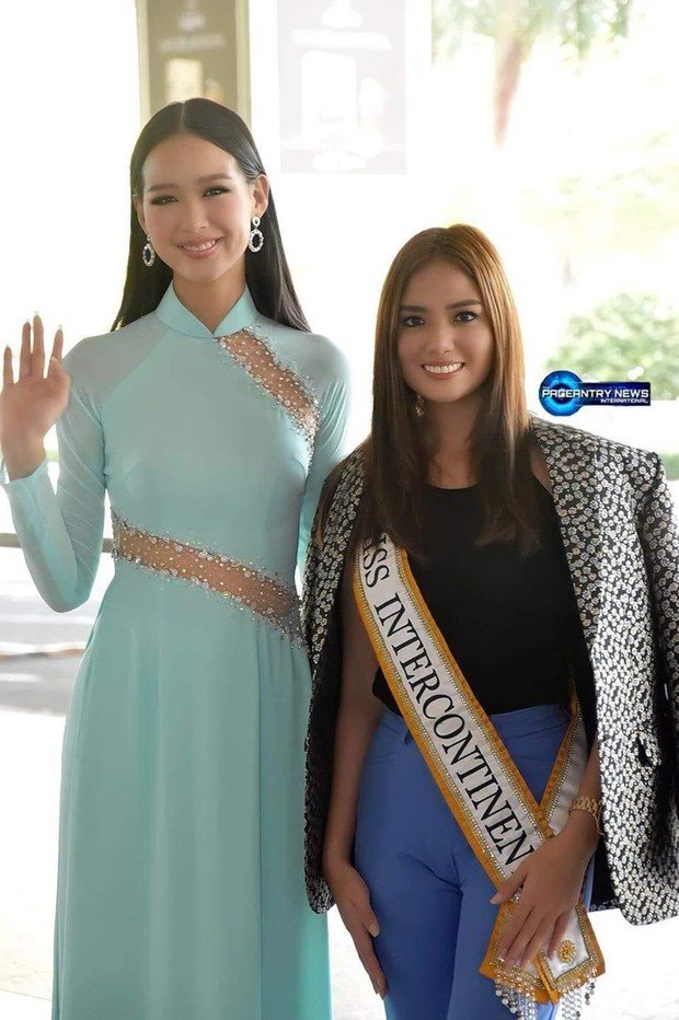 Á hậu Bảo Ngọc nổi bật với chiều cao 1m85 khi mặc áo dài ra sân bay đón Hoa hậu Liên lục địa 2021 - Ảnh 3.