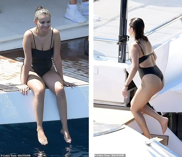 Selena Gomez in a swimsuit showing off her fat is still praised for her beauty and love for strange boys - Photo 2.