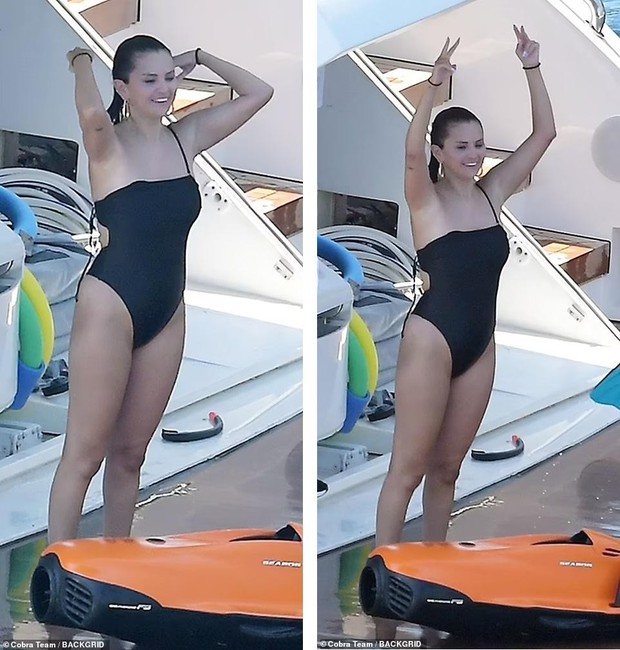 Selena Gomez in a swimsuit showing off her fat is still praised for her beauty and love for strange boys - Photo 1.