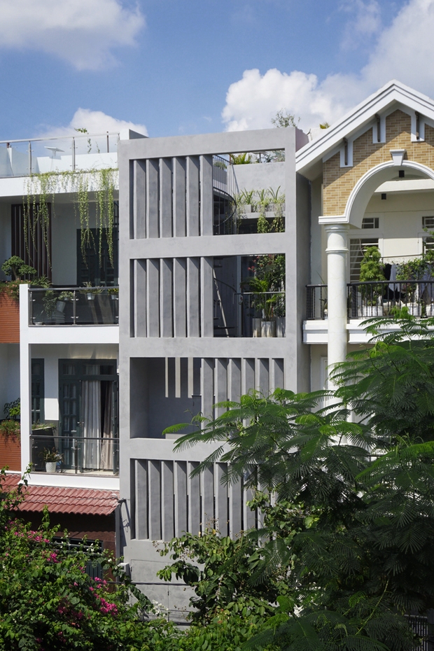 Ngôi nhà đón nắng, mưa ở TPHCM xuất hiện trên tạp chí kiến trúc danh tiếng - Ảnh 1. Ngôi nhà đón nắng, mưa ở TPHCM xuất hiện trên tạp chí kiến trúc danh tiếng - Ảnh 1.