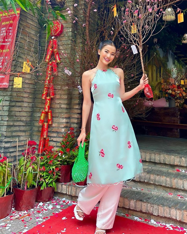 Diện áo dài local brand Việt: Hoa hậu Mai Phương hoá gái ngoan sau loạt ồn ào, bạn gái Đoàn Văn Hậu kiều diễm tựa nàng thơ - Ảnh 14.