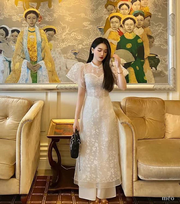 8 mẫu áo dài Tết giá từ 500.000 đồng: Chất lượng cực ổn áp, diện lên lập tức được khen xinh - Ảnh 1.